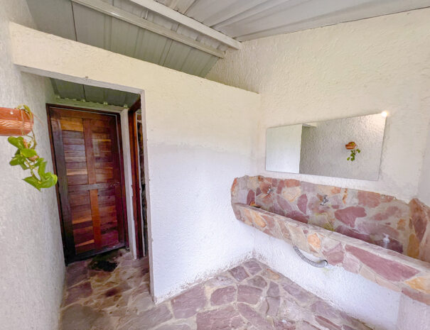 Baño cabañas triangulares